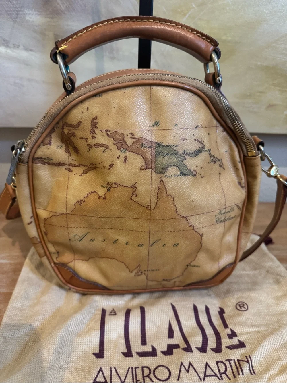 Alviero Martini Italian Map-Print Round Crossbody Bag in Tan